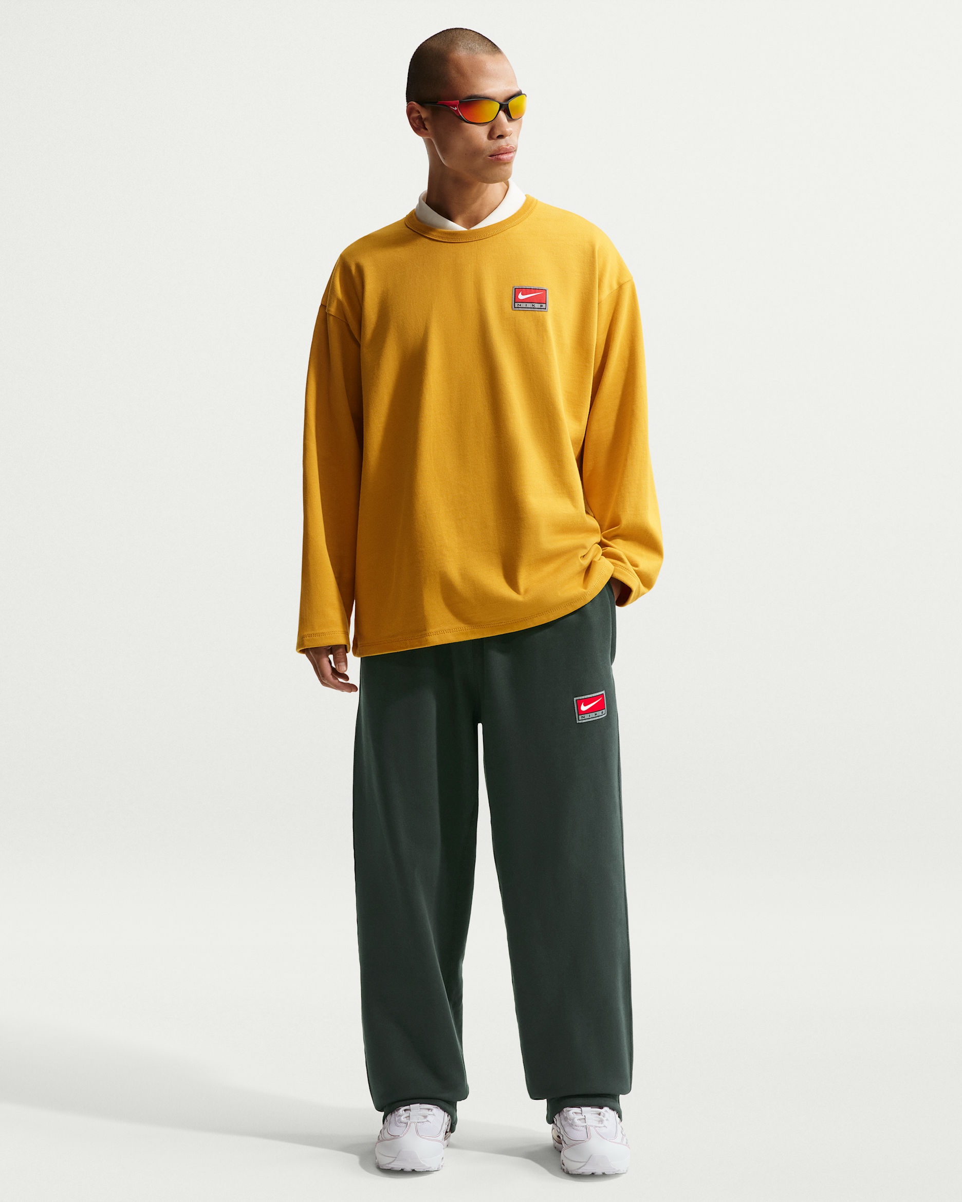 Nike Solo Swoosh Men's Fleece Open-Hem Trousers. Nike CA